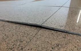 Example of uneven tile surfaces and poor spacing