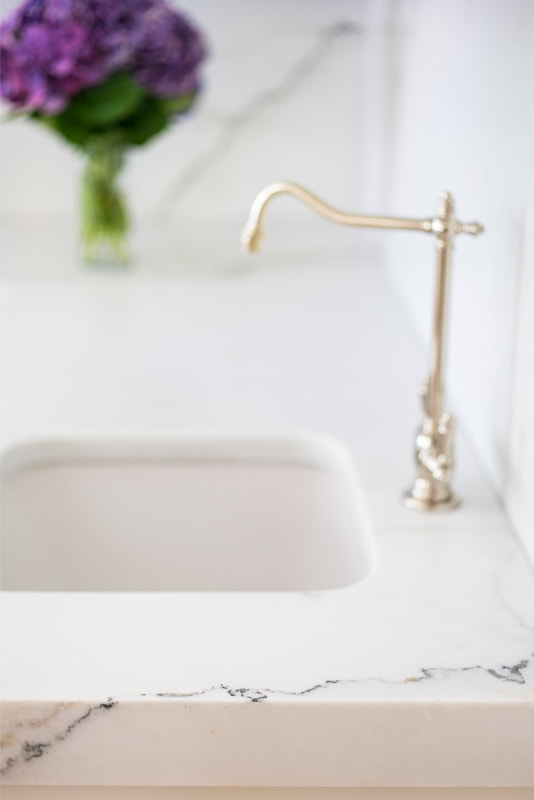 Professional tile contractor working on a beautiful bathroom renovation in Portland home